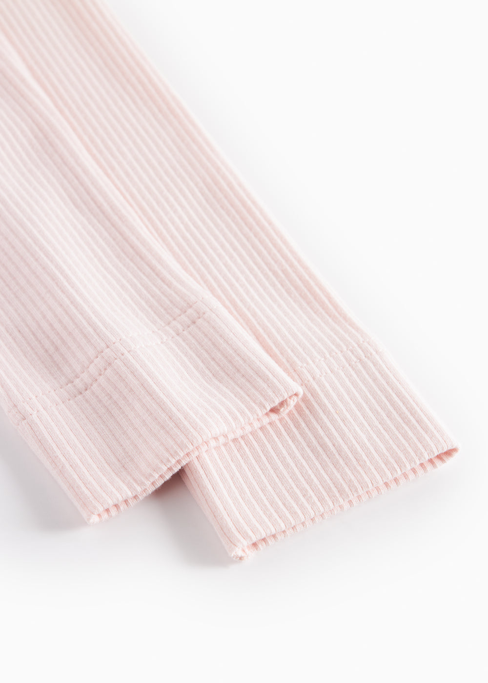 Rosa leggings med ribbet overflade og smal afslutning ved anklen