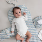 Hvid bodystocking med lange ærmer på baby