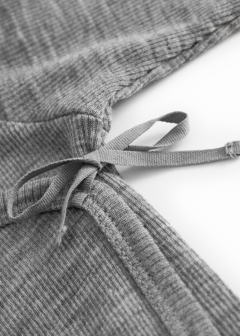 Uld rib bodystocking i grå melange med knyttet sløjfe i halsen