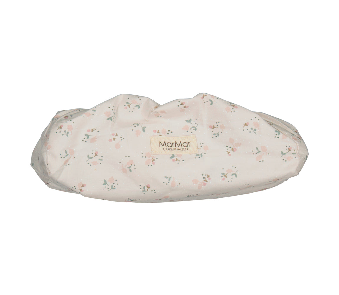 Vådservietovertræk i lyse beige med små blomster, elastisk kant og MarMar-logo