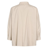 Beige skjorte set bagfra med krave