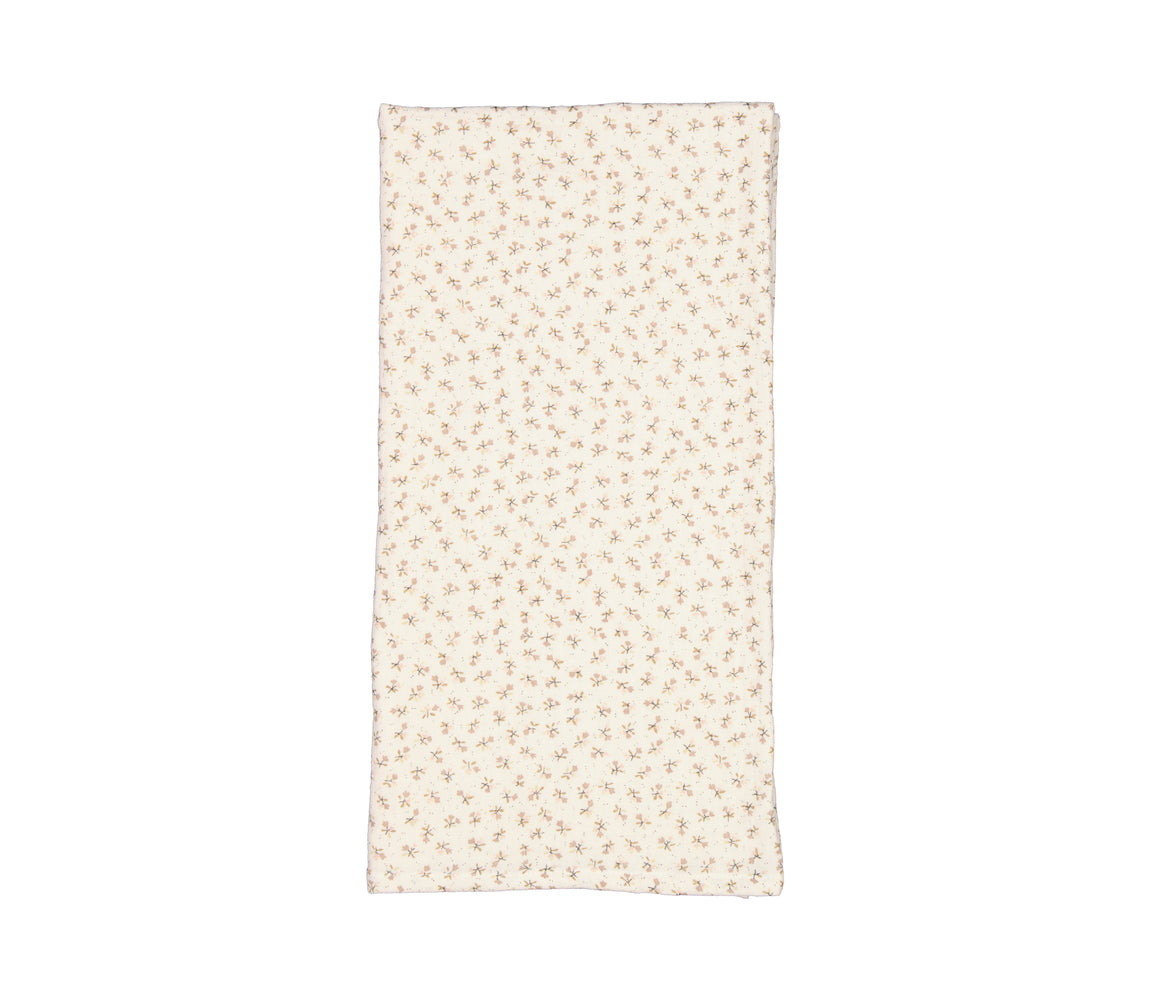 Svøb i lys creme med små blomster og kvisteprint