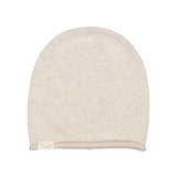 Anna W kashmirhue i lysebeige med logo-label ved kanten