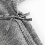 Uld pointelle bodystocking i grå meleret med knyttelukning ved hals og markeret søm