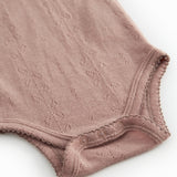 Bini uld pointelle bodystocking i rosenrød med trykknap ved benåbning