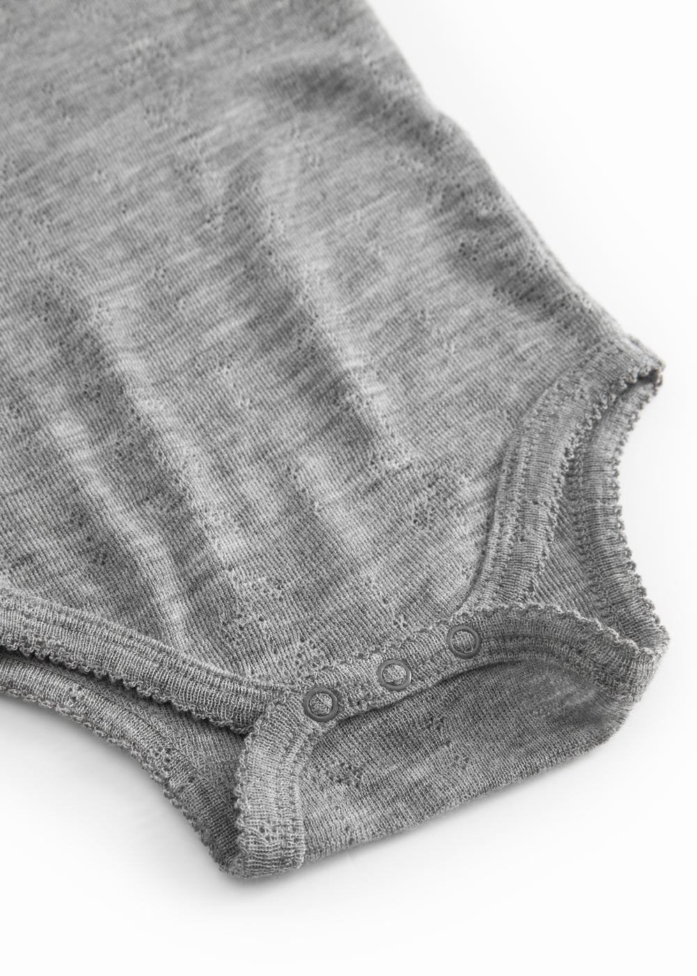 Grå melange uld bodystocking med trykknapper ved benåbning og ribkant