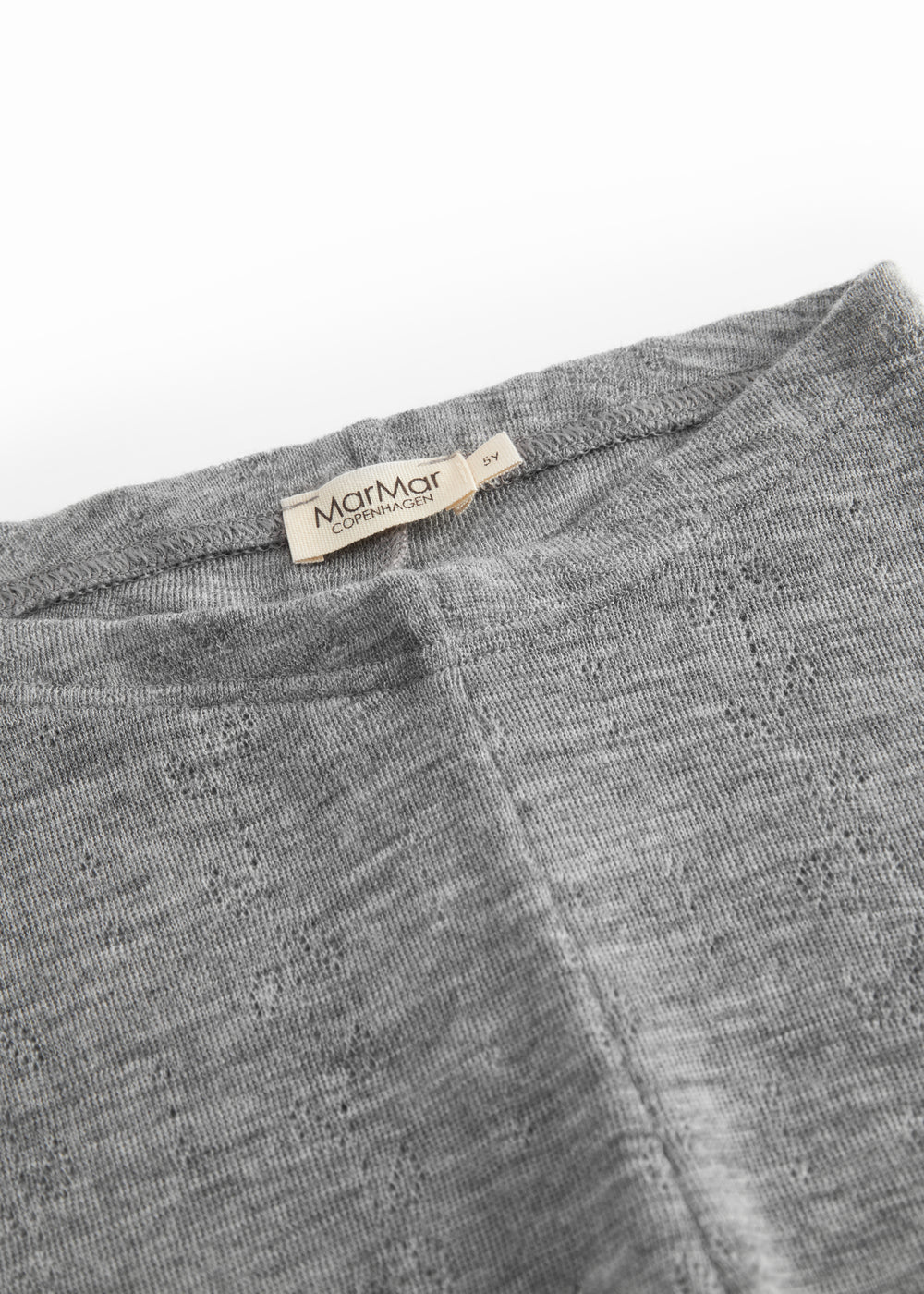 Gråmelerede uld leggings med pointelle-strik og elastisk linning, synlig mærkeetiket.