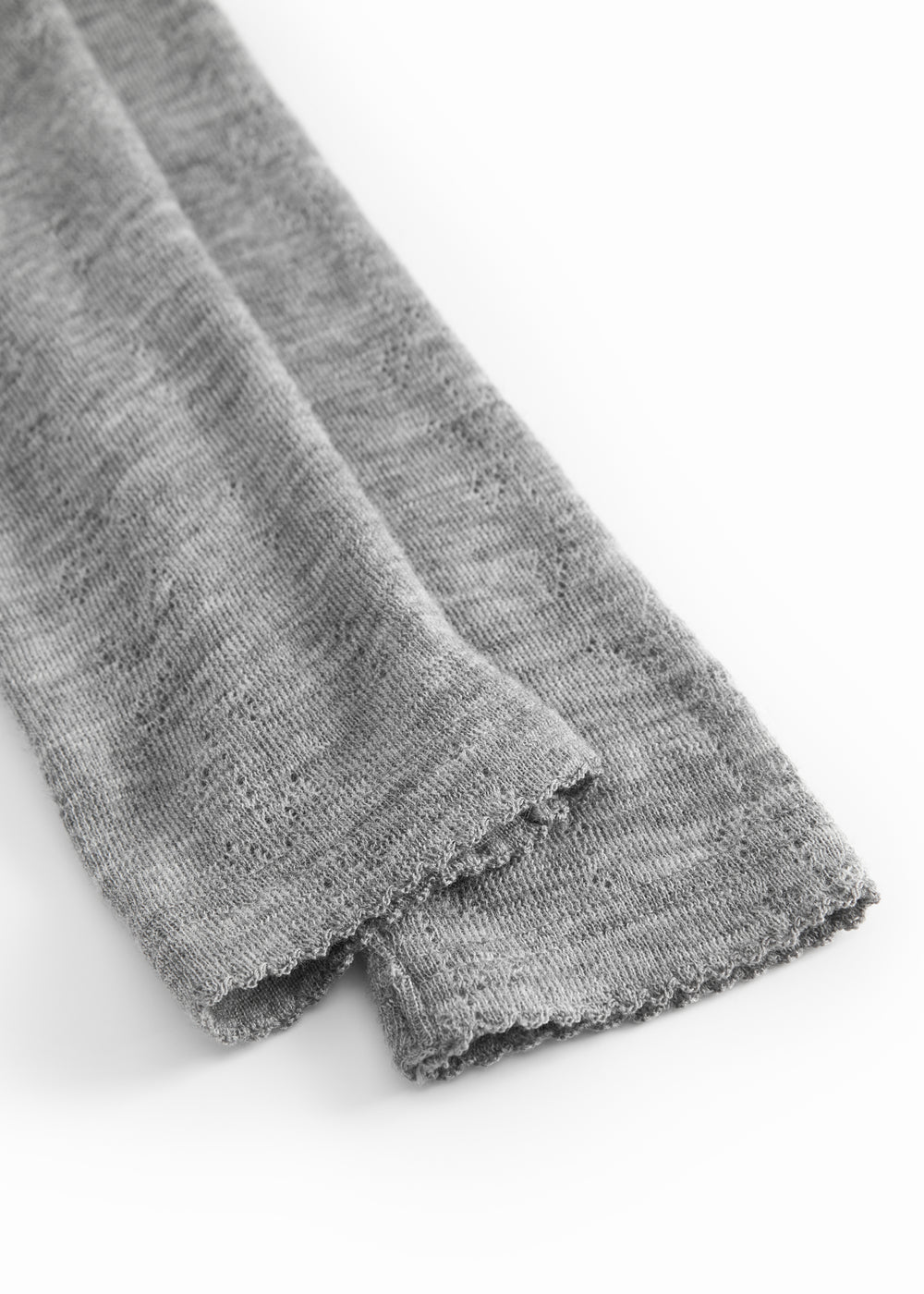 Gråmelerede uld leggings med let rynket kant ved benåbning.