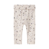 Babybukser i lyst stof med Moomin-print