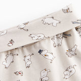 Barnbukser med fødder i lyst stof med Moomin-print