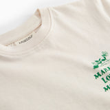 Råhvid T-shirt med grønt Moomin print til børn