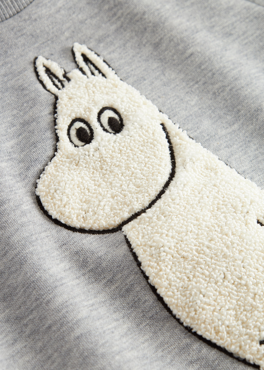 Børnetrøje med langt ærme og Moomin-motiv i blød teddy-stof