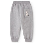 Grå sweatpants til baby med diskret Mumin-figurprint på benet og elastik i taljen