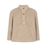 Beige teddytrøje til børn med knapper og stor buet forlomme