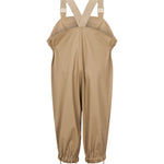beige regnbukser med seler og fodstropper, set bagfra