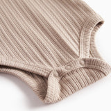 Beige pointelle body med lange ærmer til baby