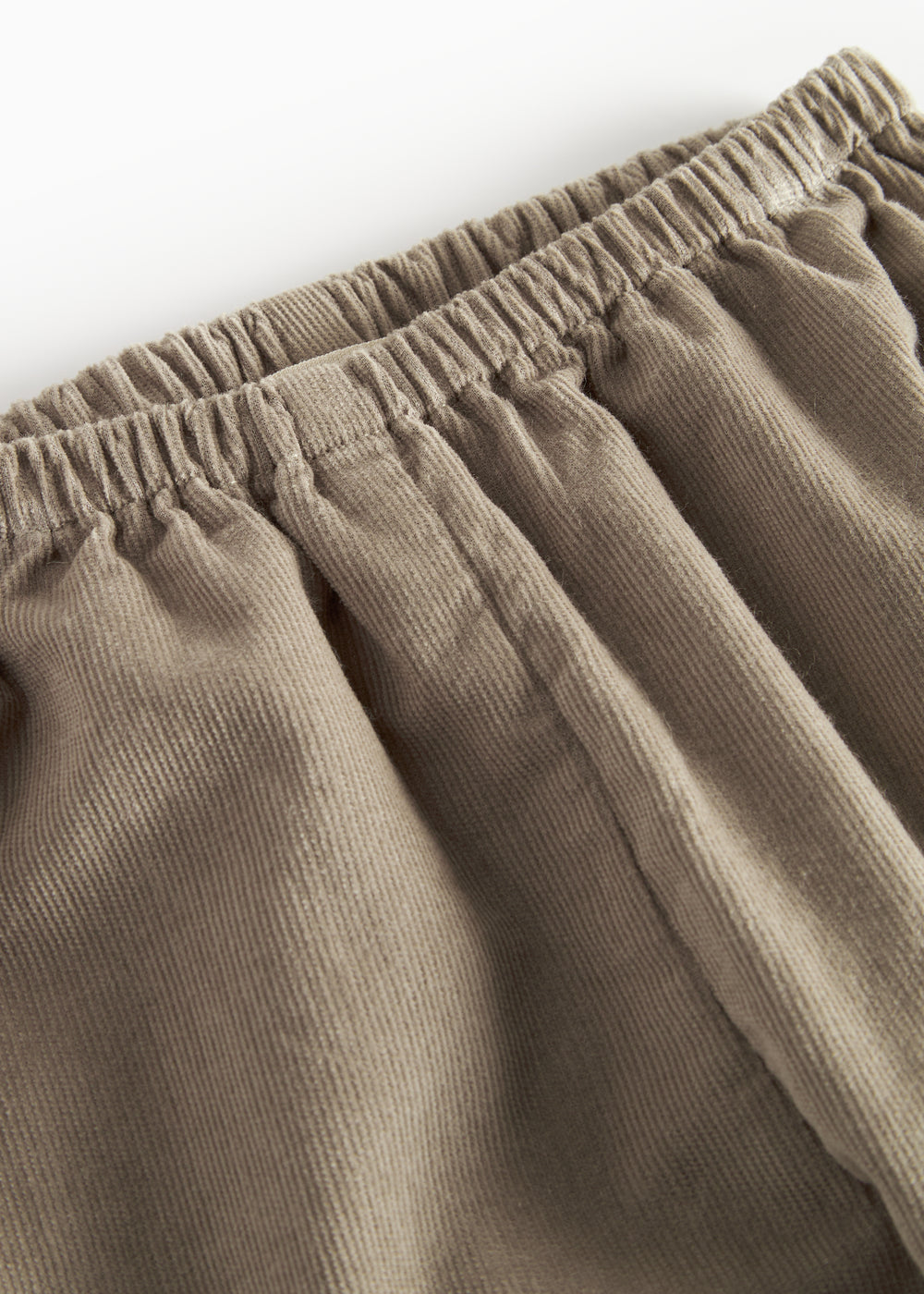 Beige babyfløjlssbukser med elastisk talje til børn