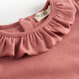 Støvet rosa bluse med flæsekrave og lange ærmer til børn