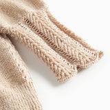 Beige cardigan med guldglimmer og fine ribdetaljer til baby