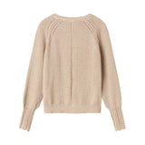 Beige cardigan med guldglimmer og fine ribdetaljer til børn
