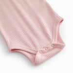 Lyserød langærmet baby bodystocking