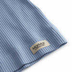 Langærmet lyseblå modal t-shirt til børn med stolpe knaplukning