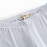 Lyseblå leggings til børn med fine flæsedetaljer forneden