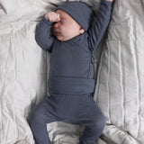 Bodystocking i mørk blågrå på baby med lange ærmer og ben