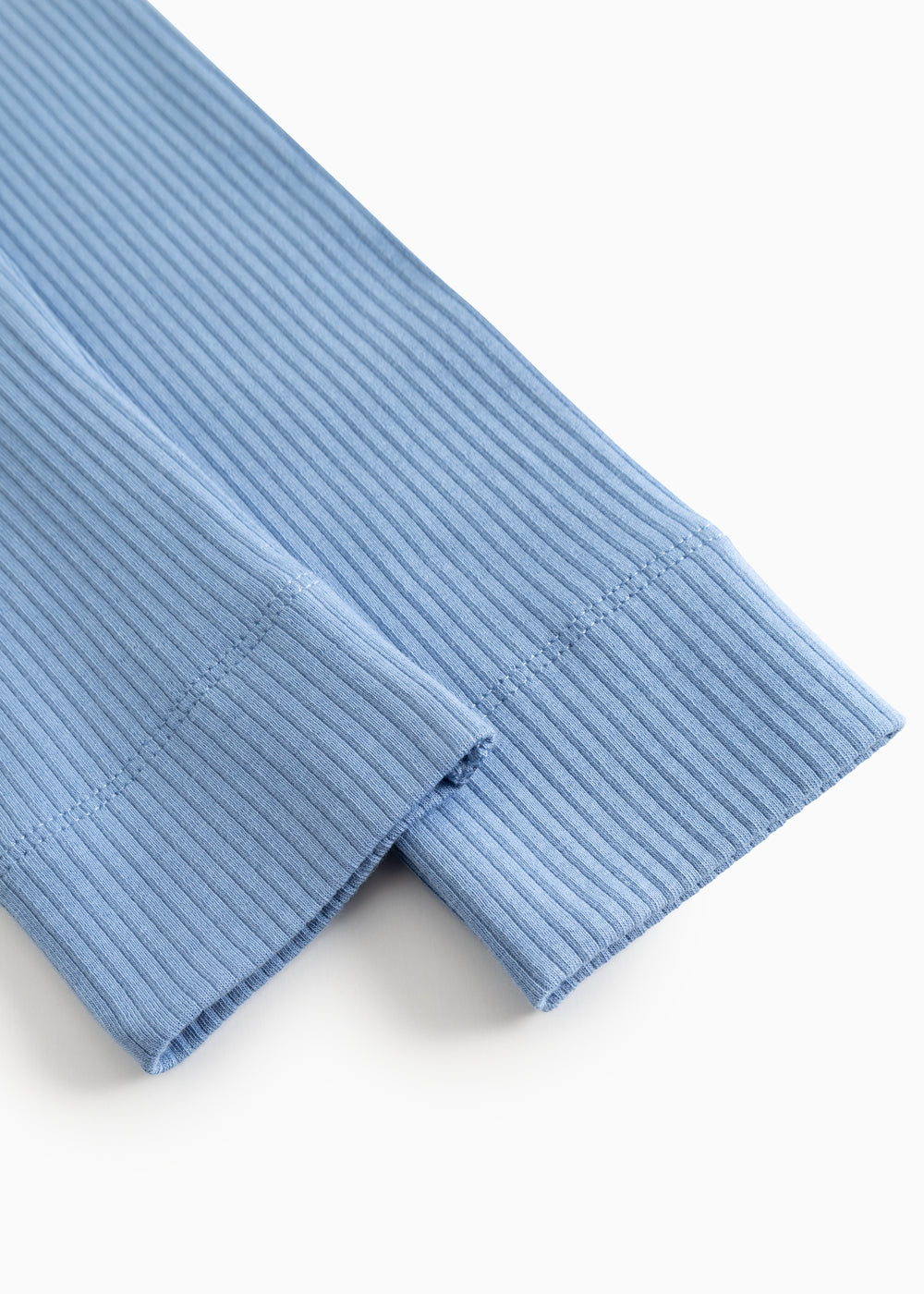 Blå ribstrikkede leggings med fold ved benafslutning