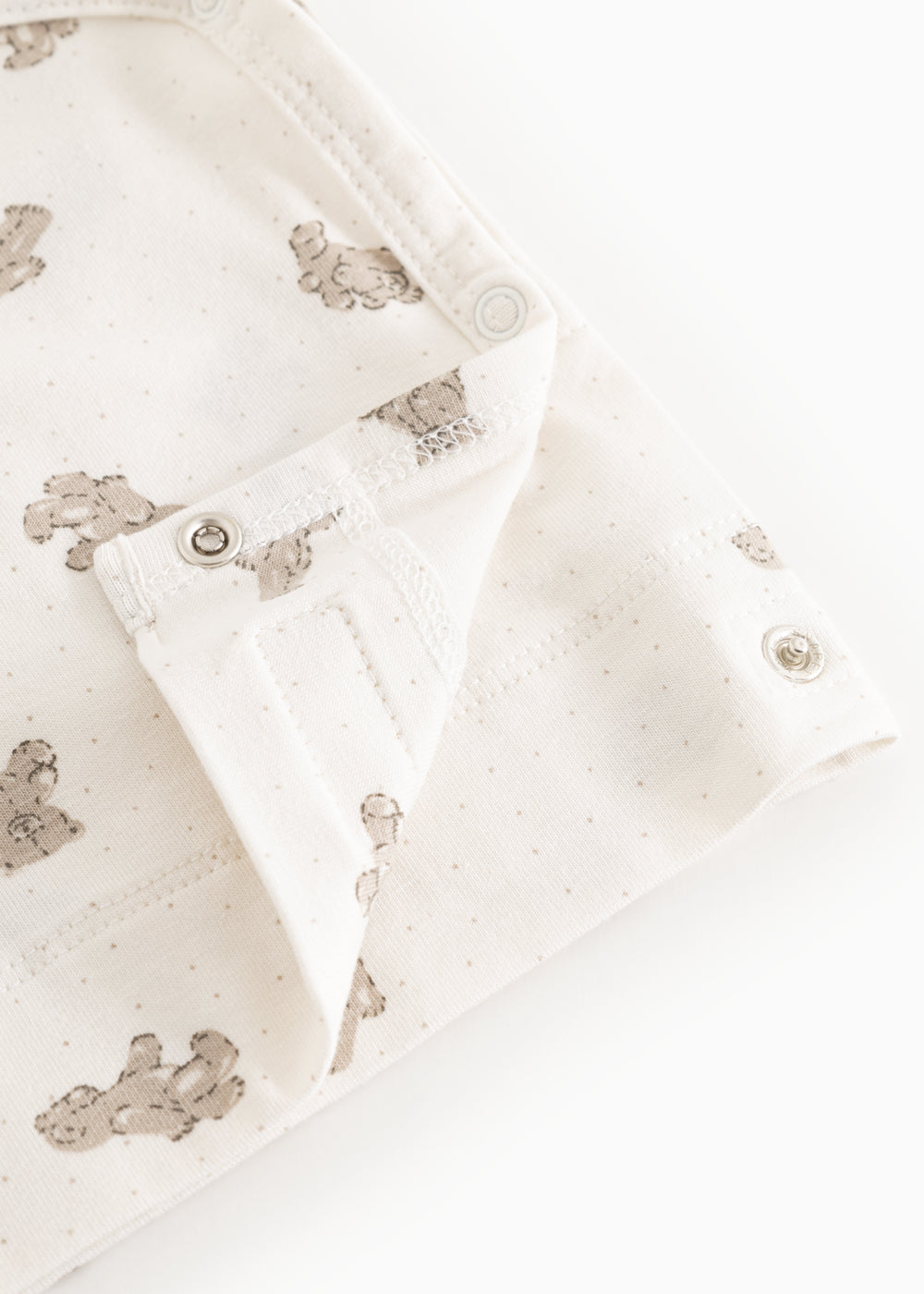 Offwhite wrap-bluse med lange ærmer, teddybjørneprint og trykknapper ved halsen