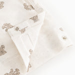 Offwhite wrap-bluse med lange ærmer, teddybjørneprint og trykknapper ved halsen