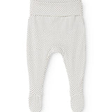 Hvide babybukser med sorte små prikker og lange ben