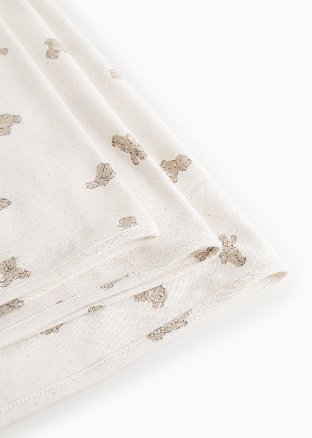 Tæppe med teddymotiver i beige på lys bund