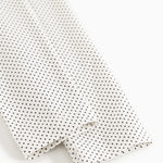 Leggingsende med elastisk kant og fint prikmønster, hvid med sorte prikker