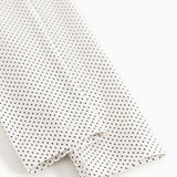 Leggingsende med elastisk kant og fint prikmønster, hvid med sorte prikker