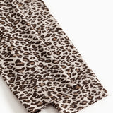 Leo Leg leggings: close-up af mørk brun leo-print ved benkant