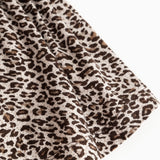 Nederdel med leopardmønster i mørk brun og beige, rynket stofdetalje