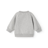 Grå bluse med ribkant ved ærmer og nedre kant, set bagfra