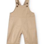 Beige selebukser til baby med justerbare seler og knaplukning foran.