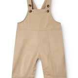 Beige selebukser til baby med justerbare seler og knaplukning foran.