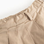 Beige nederdel med elastisk talje og fine søm- og foldlinjer