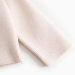 Rosa strikket cardigan-ærme med ribkant